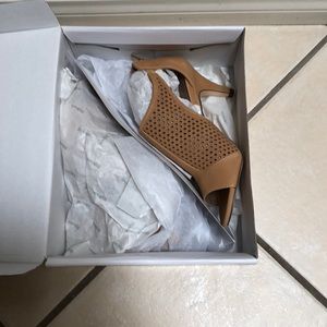 Brand new, never been worn bootie. Still in box